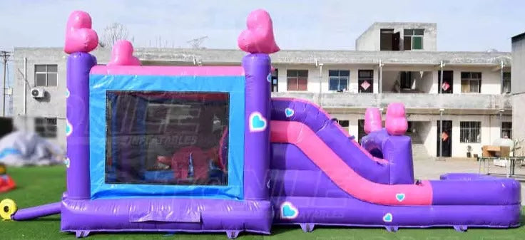 unicorn bounce house with slide side view